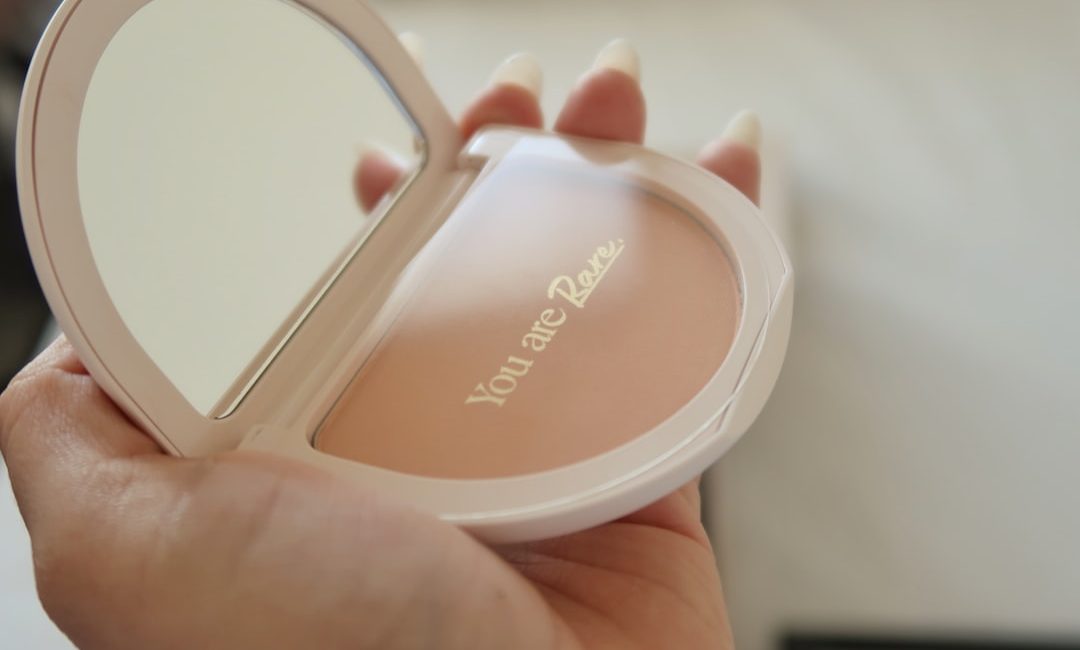 A person holding a compact compact compact compact compact compact compact compact compact compact compact compact