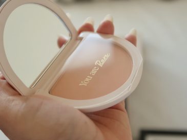 A person holding a compact compact compact compact compact compact compact compact compact compact compact compact