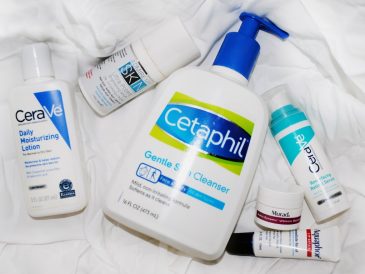 a bottle of cetaphil, a tube of deodorant,
