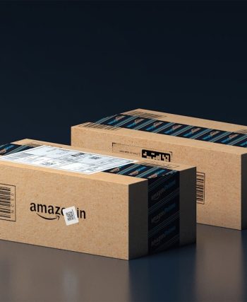 two boxes of amazon are stacked on top of each other