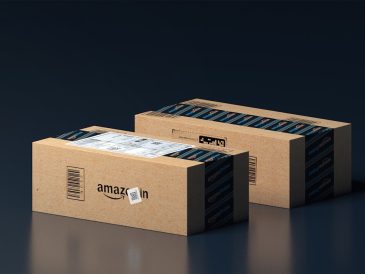 two boxes of amazon are stacked on top of each other