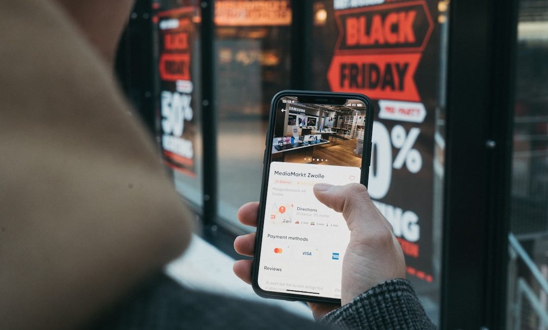 person holding black samsung android smartphone