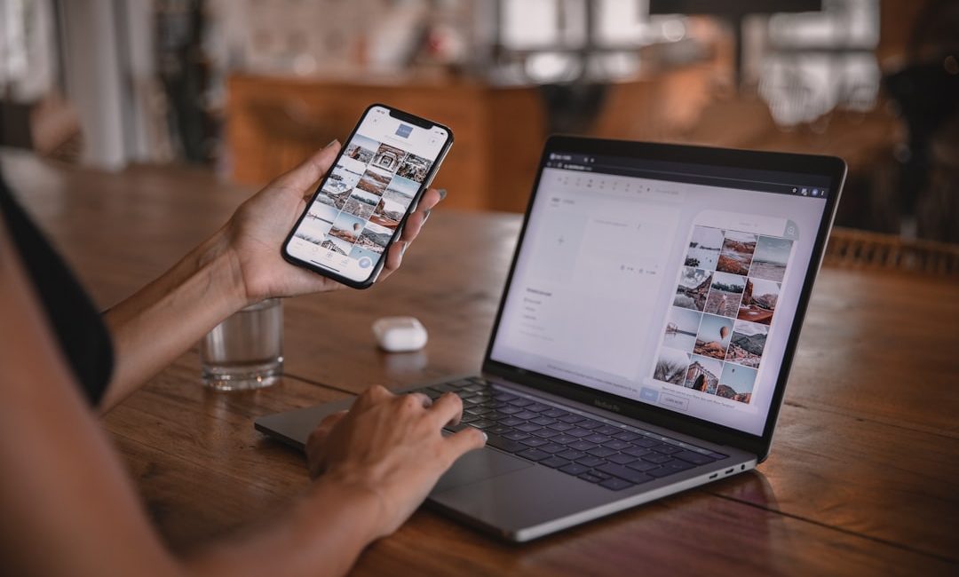 person holding silver iphone 6