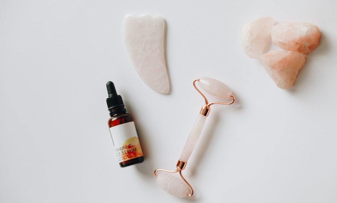 white and black plastic bottle beside white heart shaped ornament